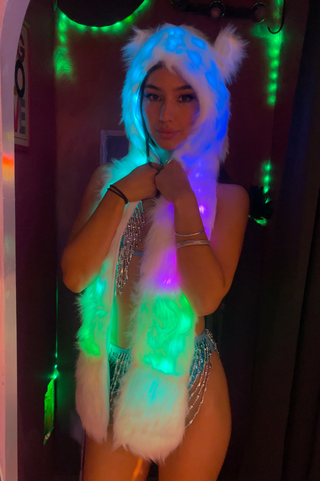 Afterglow LED Animal Hat Hood with glowing blue and green lights, perfect for rave and festival outfits on Wild Thing.