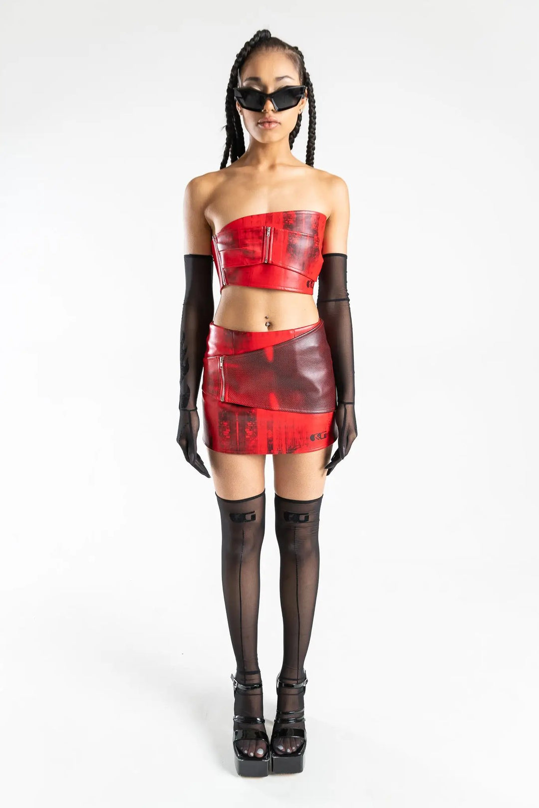 Faux Leather Red Top styled with matching mini skirt, sheer gloves, and thigh-high stockings. Rave and festival clothing by Wild Thing.