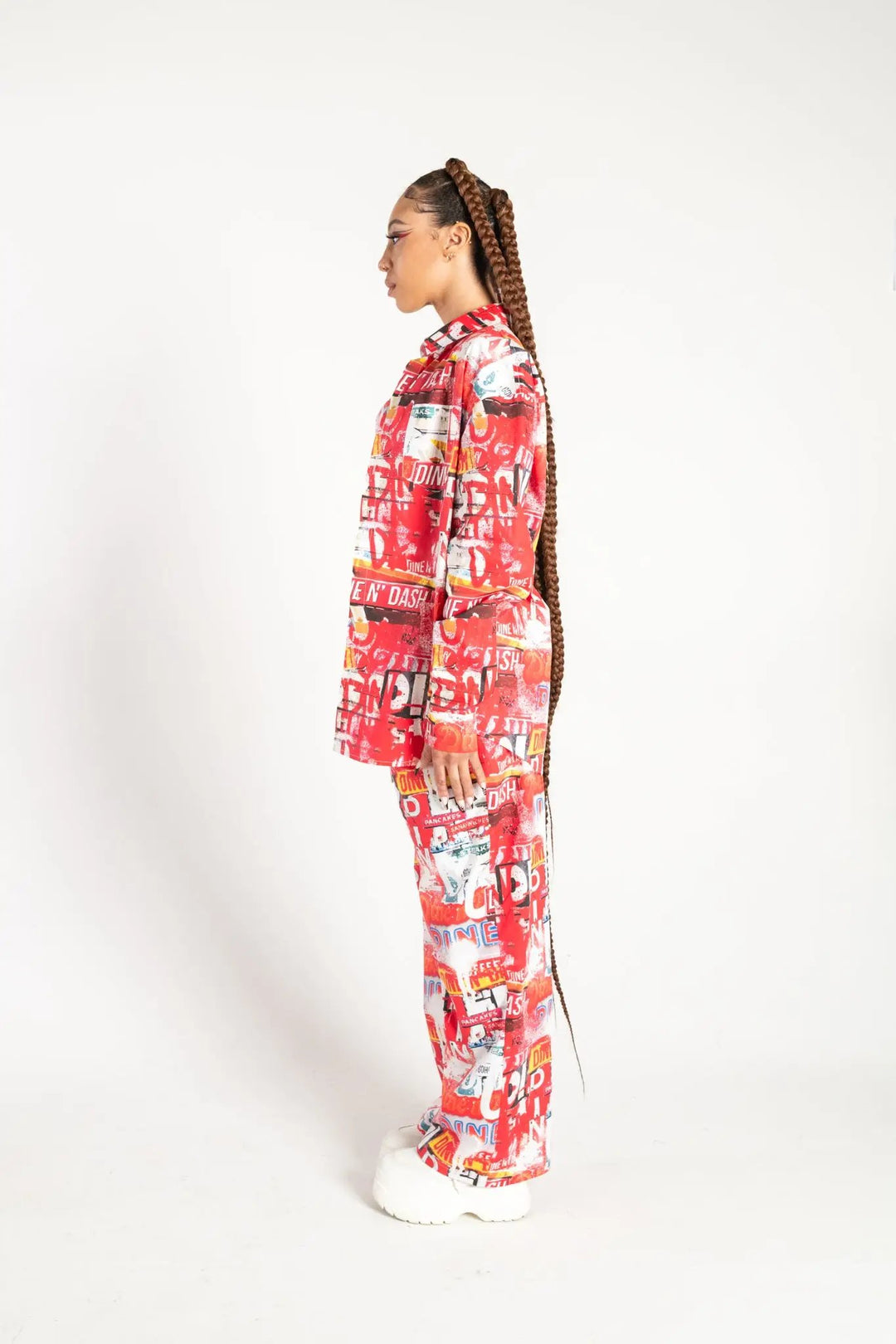 Right side profile of Dine and Dash Shirt with vivid red graphics, a standout piece in Wild Thing’s rave and festival clothing collection.