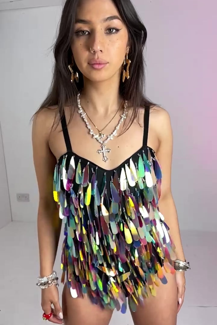 Close-up of Angel Dust Bodysuit worn with layered necklaces, showcasing vibrant sequin texture and fitted stretch design.