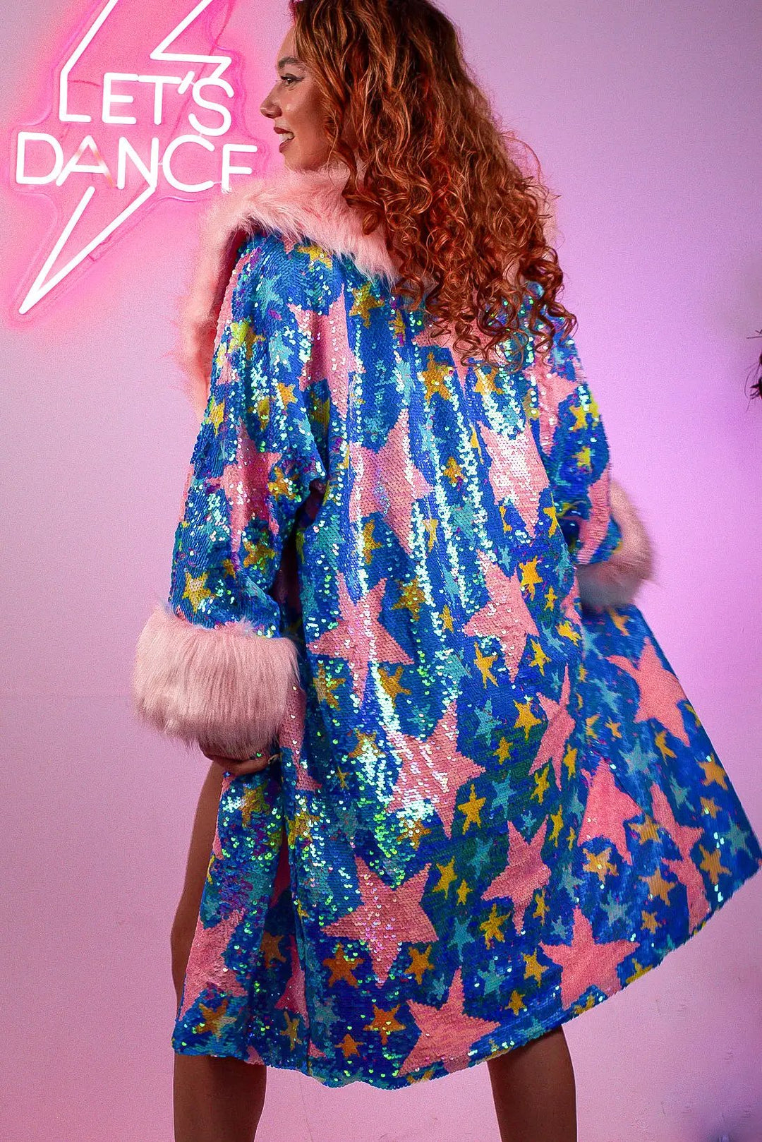 Colorful sequin jacket with pink stars and fur trim