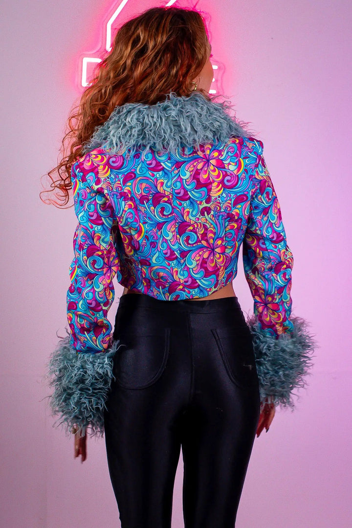 Back view of Shroom 2 way Jacket with colorful pattern.