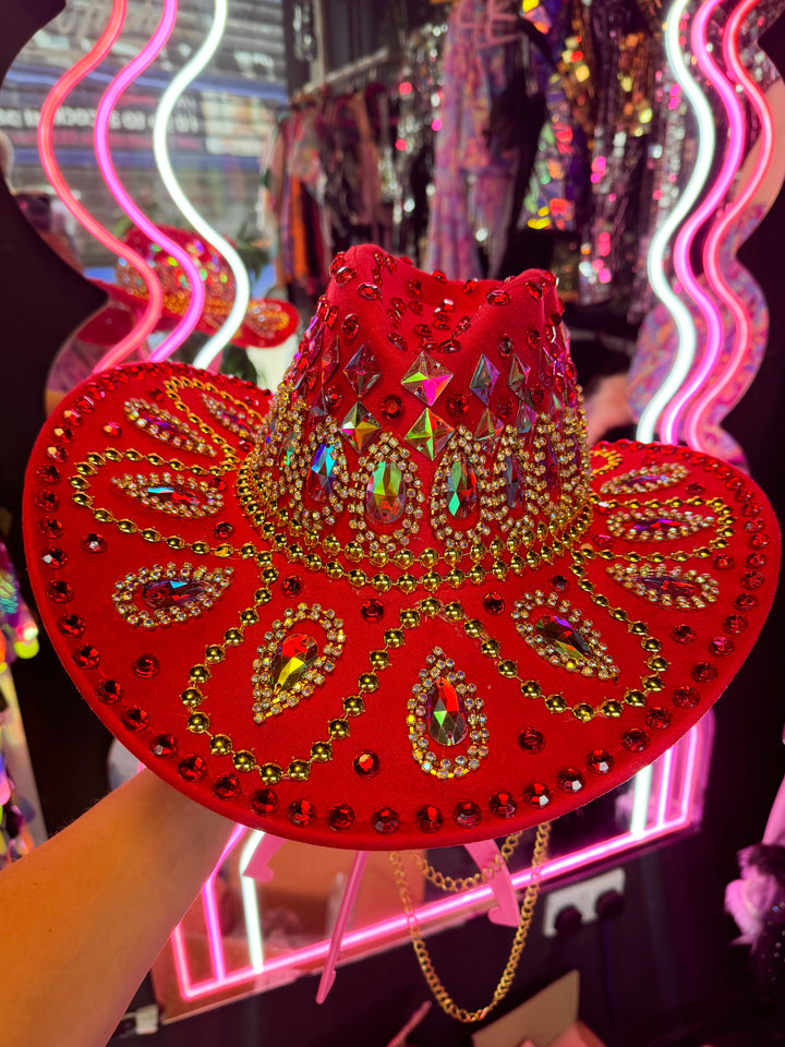 Decorative red cowboy hat with sparkling gems