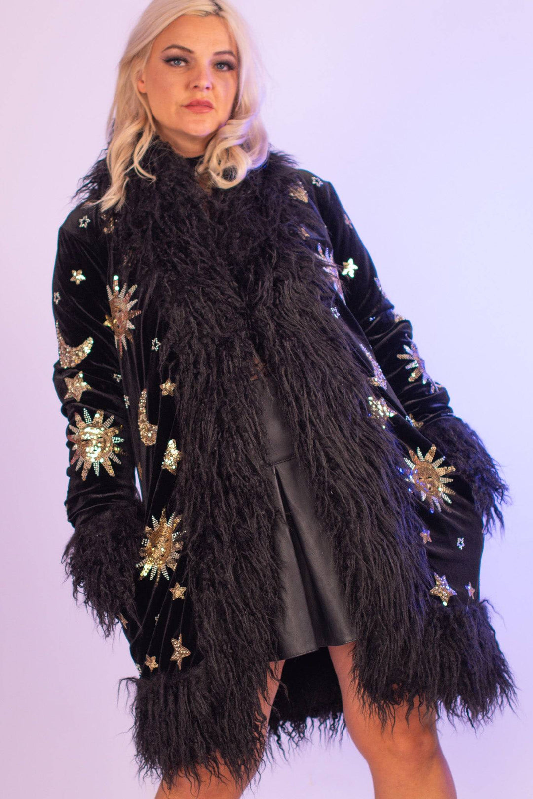 Celestial sequin coat with sun and moon design, front view