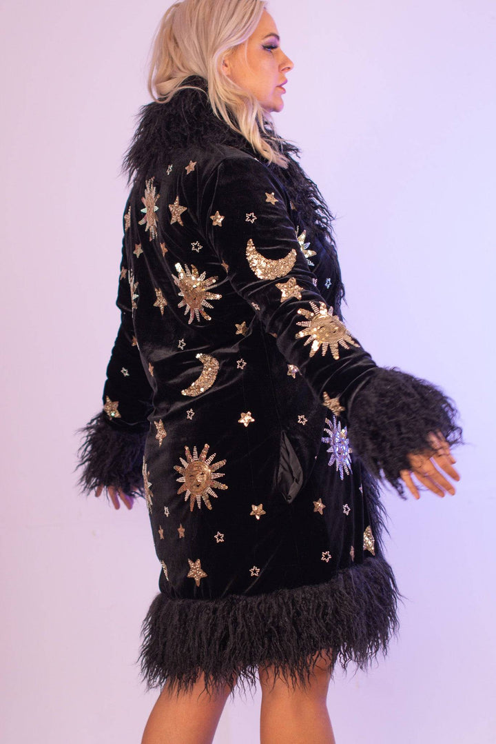 Side view of celestial-themed sequin coat