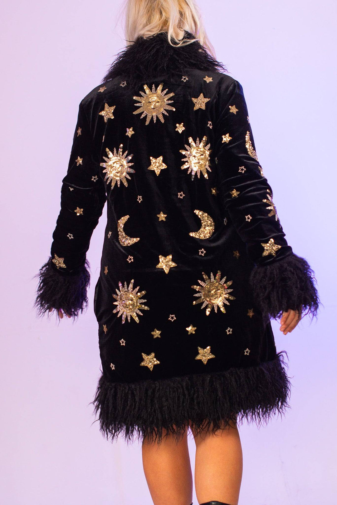 Back view of celestial sequin coat with sun and moon