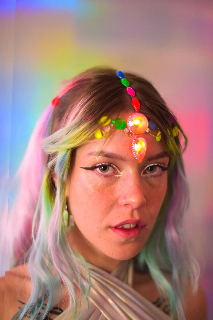 Festival look with light-up UV face jewels