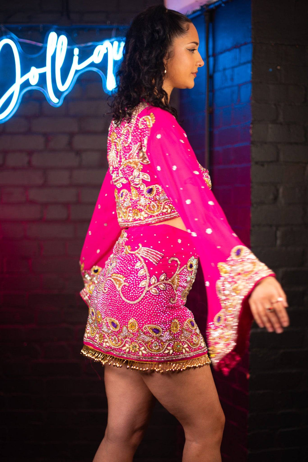 Side view of pink embellished bell sleeve set