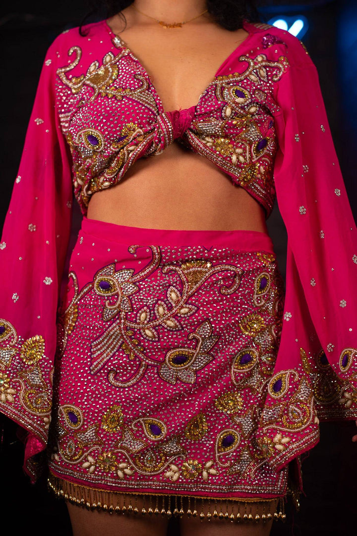 Close-up of pink embellished bell sleeve set