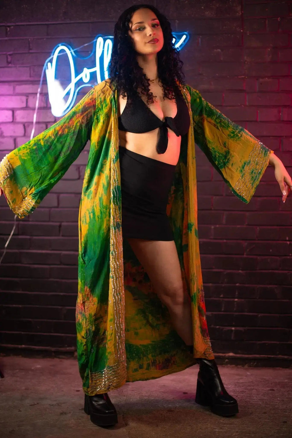 Front view of green and yellow tie-dye kimono with wide sleeves