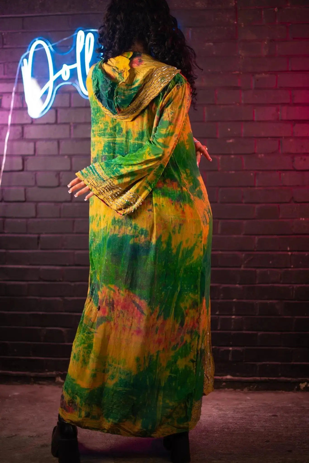 Back view of green and yellow tie-dye kimono with hood