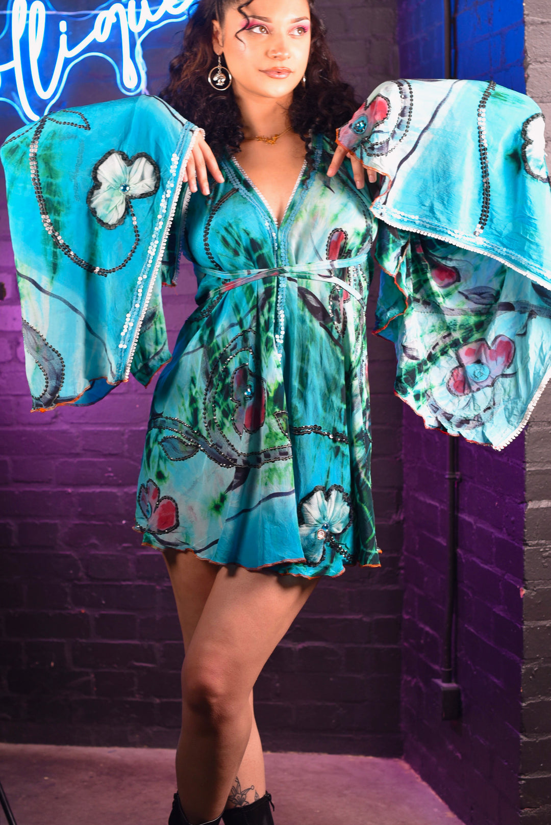 Tropical mini dress with bell sleeves, front view