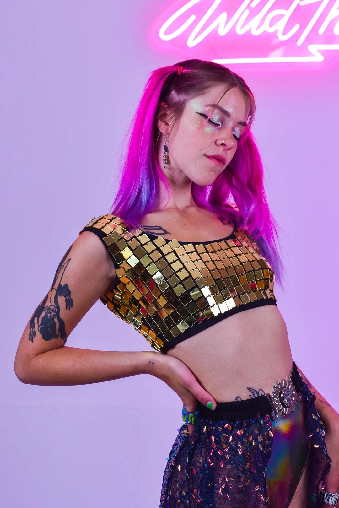 Side pose of Gold Molly Mirror Crop Top on model