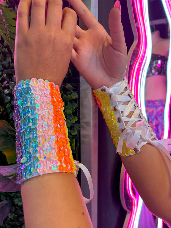 Colorful sequin arm cuffs with lace-up design