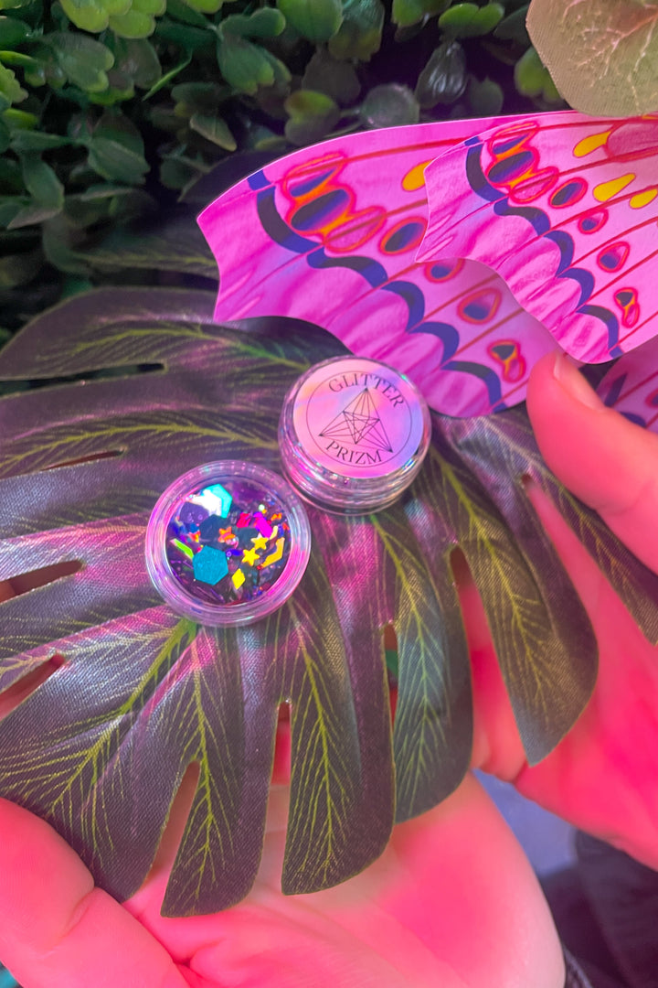 Glitterprizm pot on leaf with butterfly design