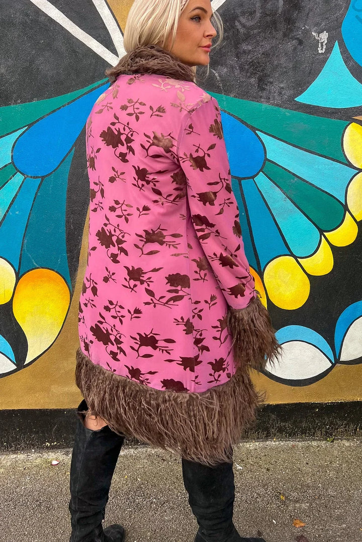 Pink floral coat with brown faux fur trim, back view