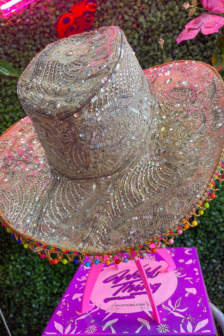 Detailed view of ornate sari hat design