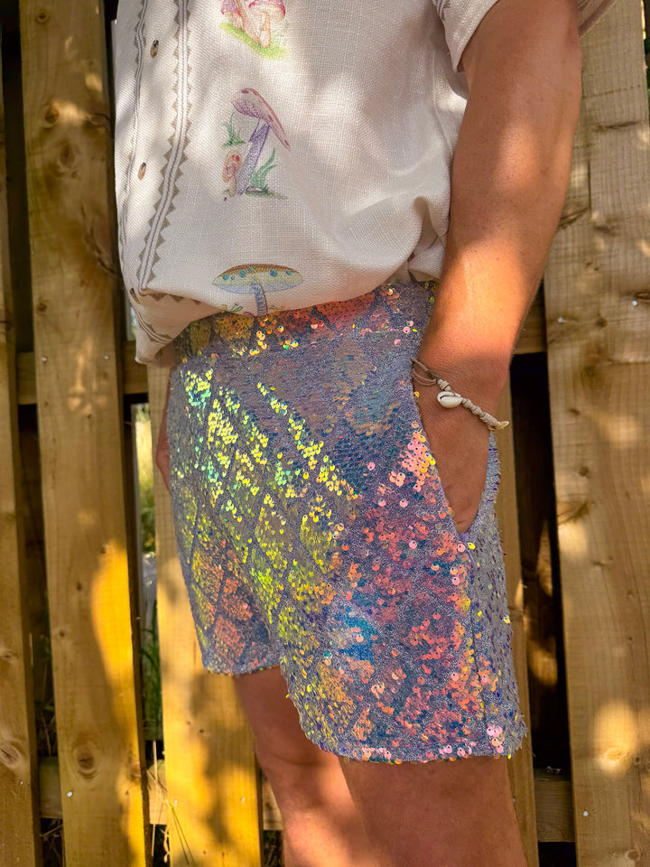 Side view of shimmering sequin shorts