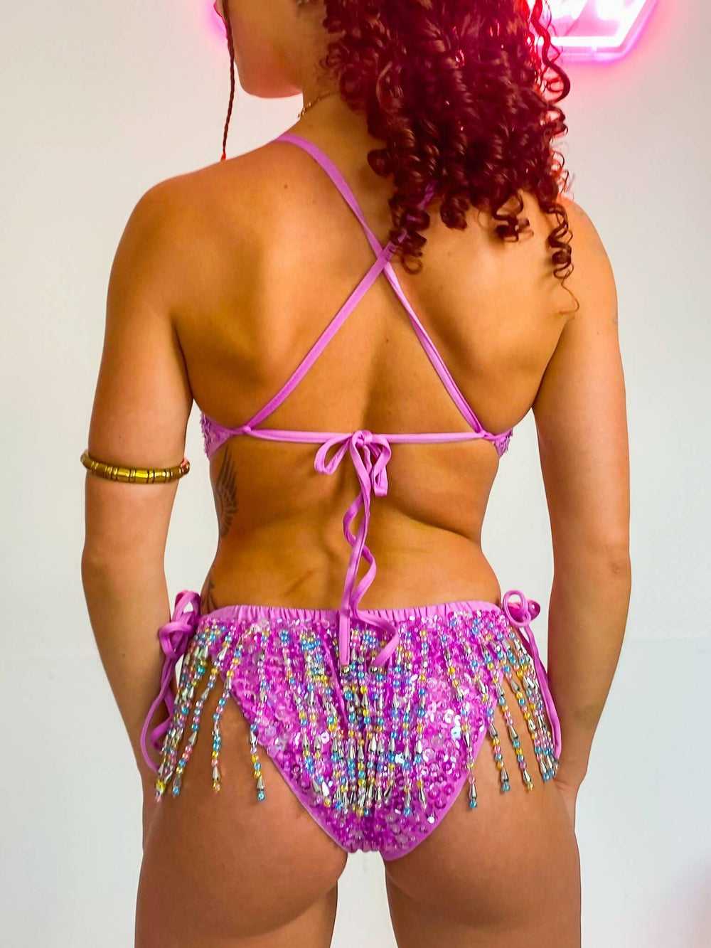 Back view of Tutti Frutti Sequin Bodysuit with cross straps