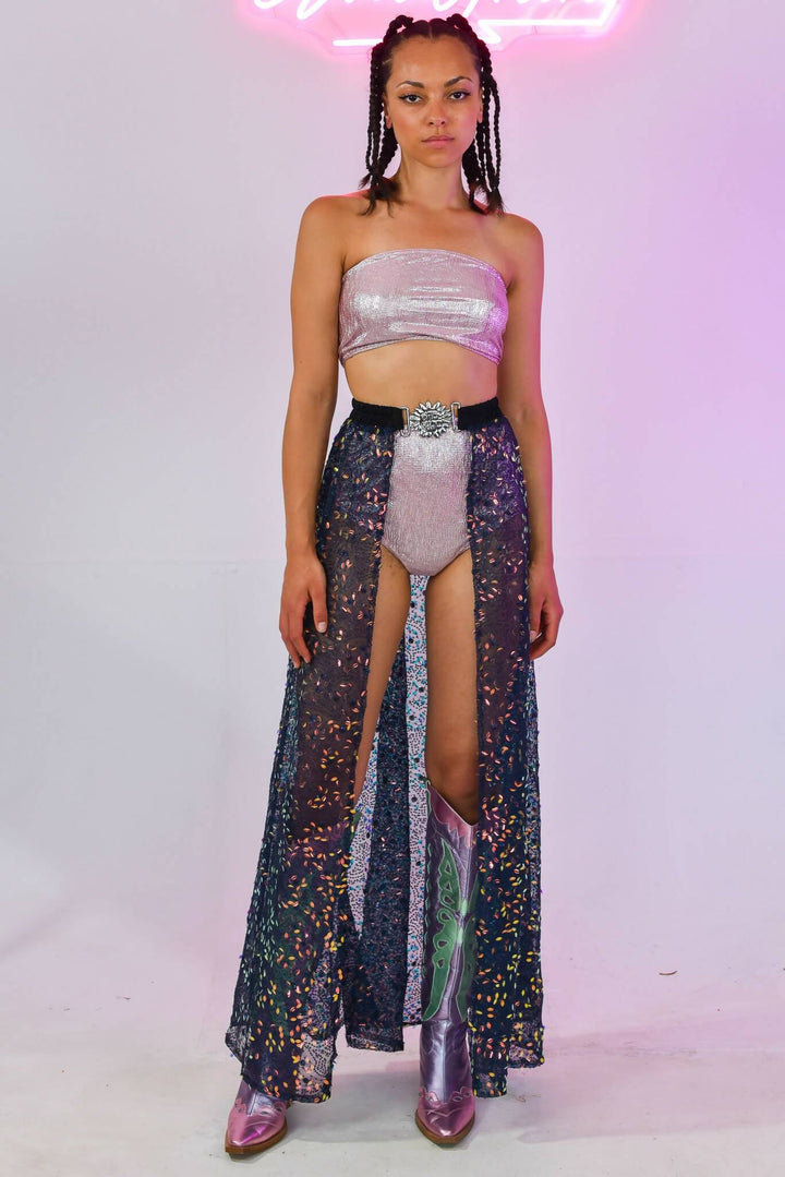 Model in pink metallic set with sheer skirt overlay