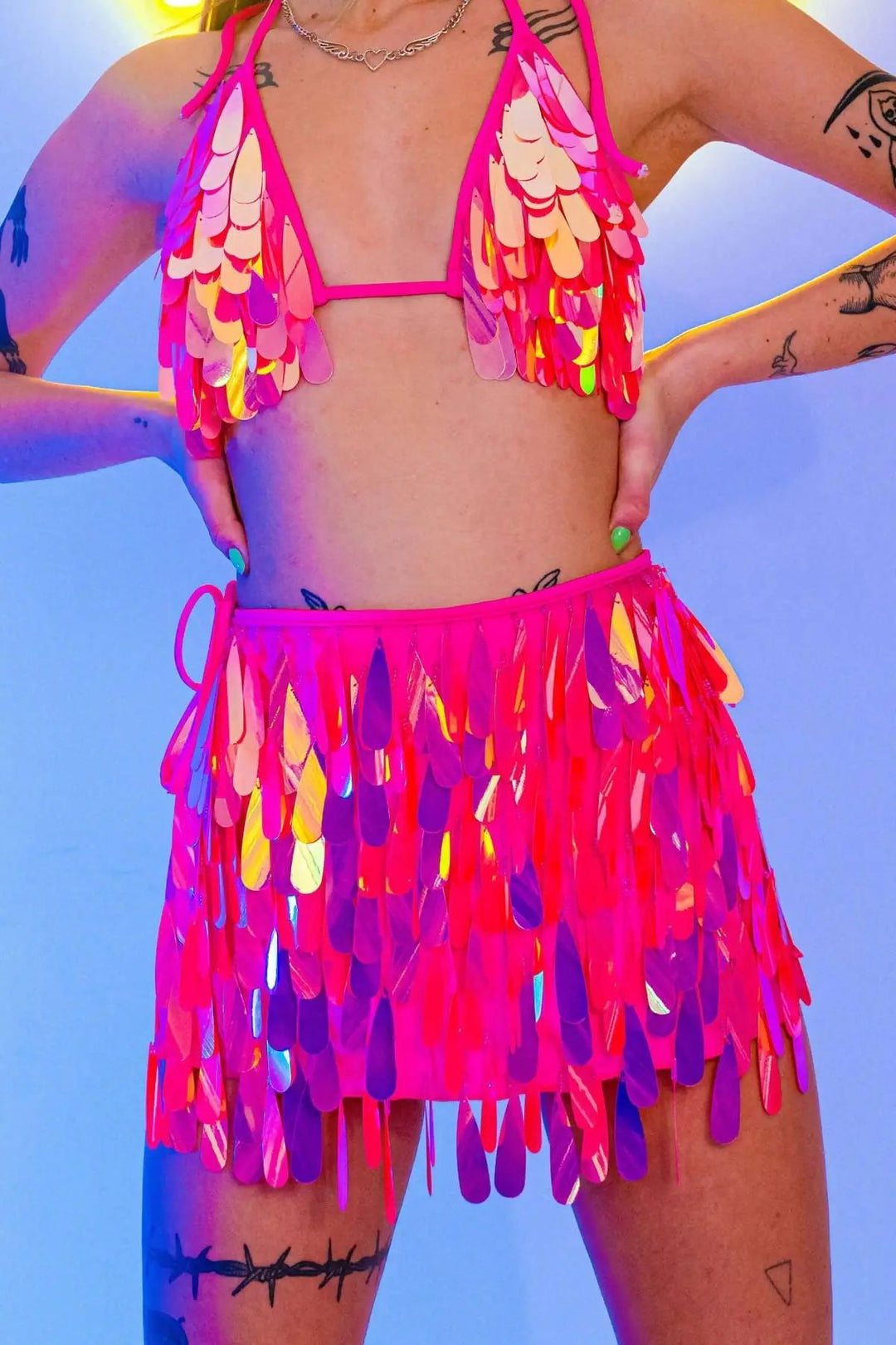 Close-up of pink sequin bikini top and skirt