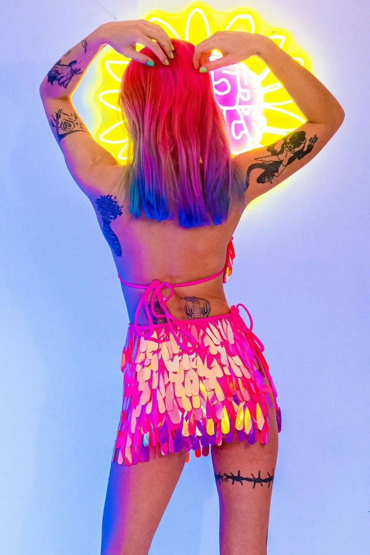 Back view of pink sequin bikini top and skirt