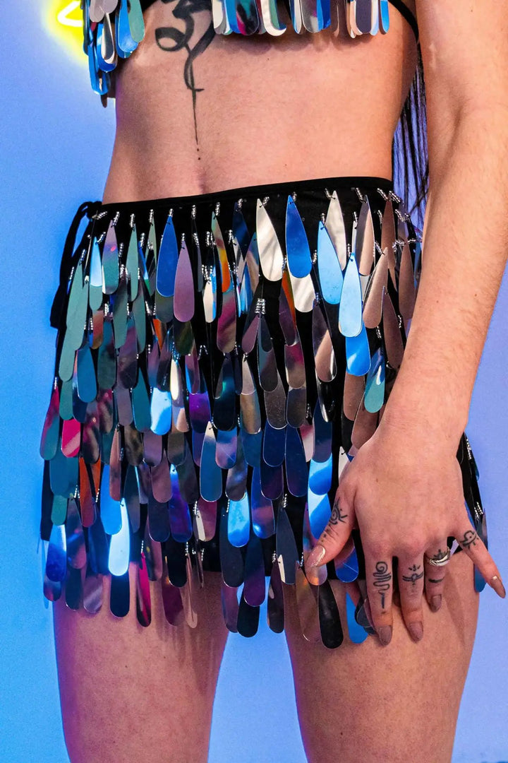 Silver sequin skirt with teardrop design, festival wear.