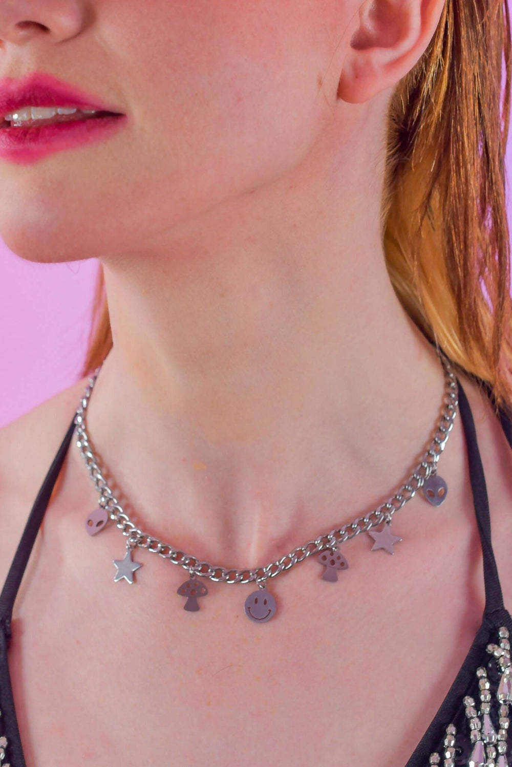 Cosmic Charm Chain necklace featuring playful metal charms