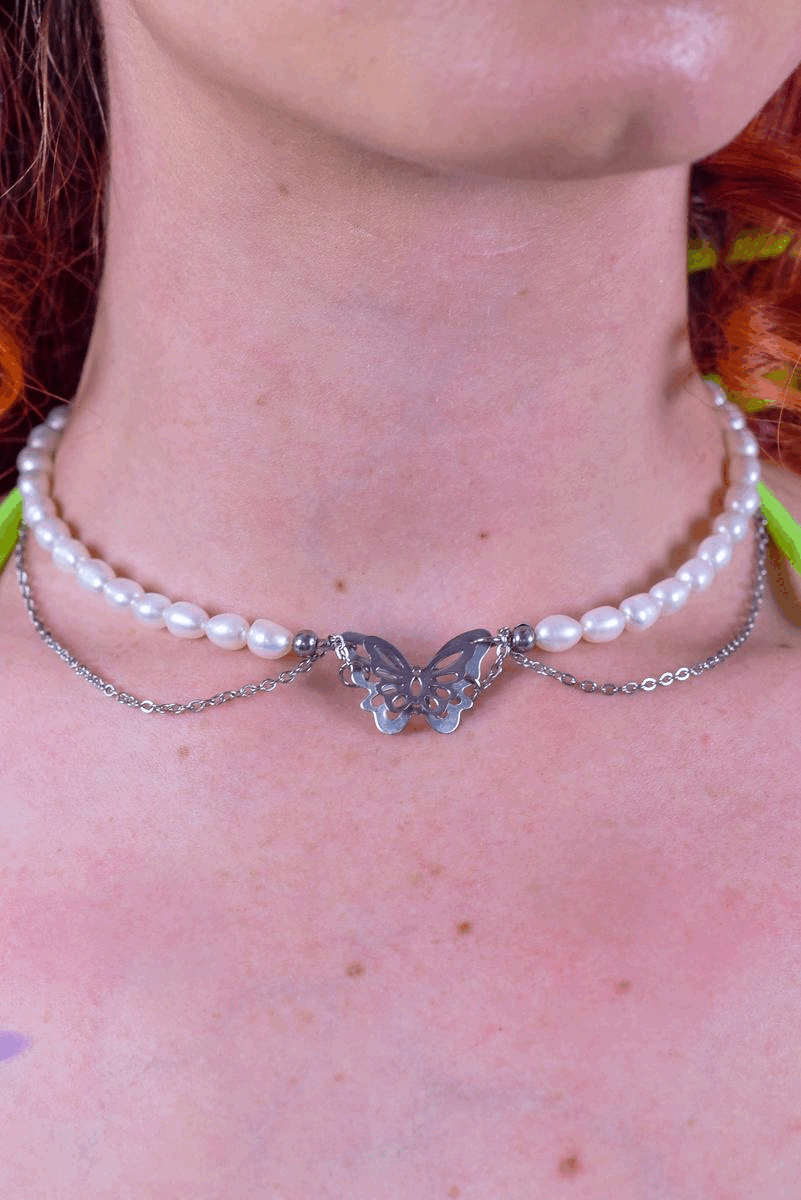 Butterfly pearl necklace with silver chain accents