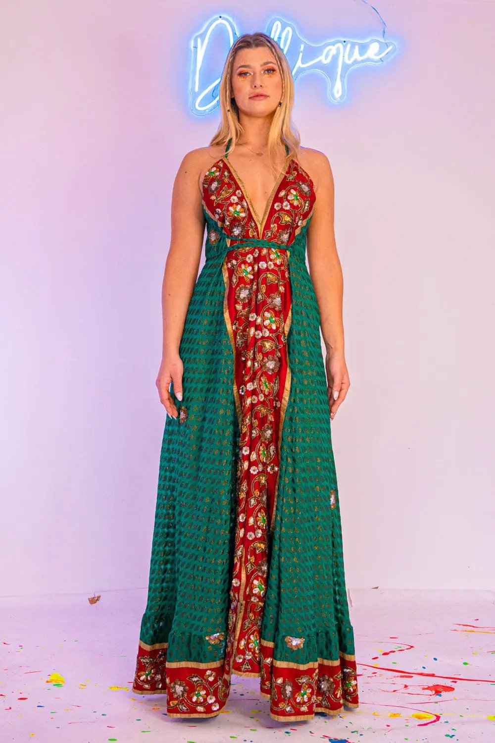 Green one-of-a-kind maxi dress with red floral accents, front view