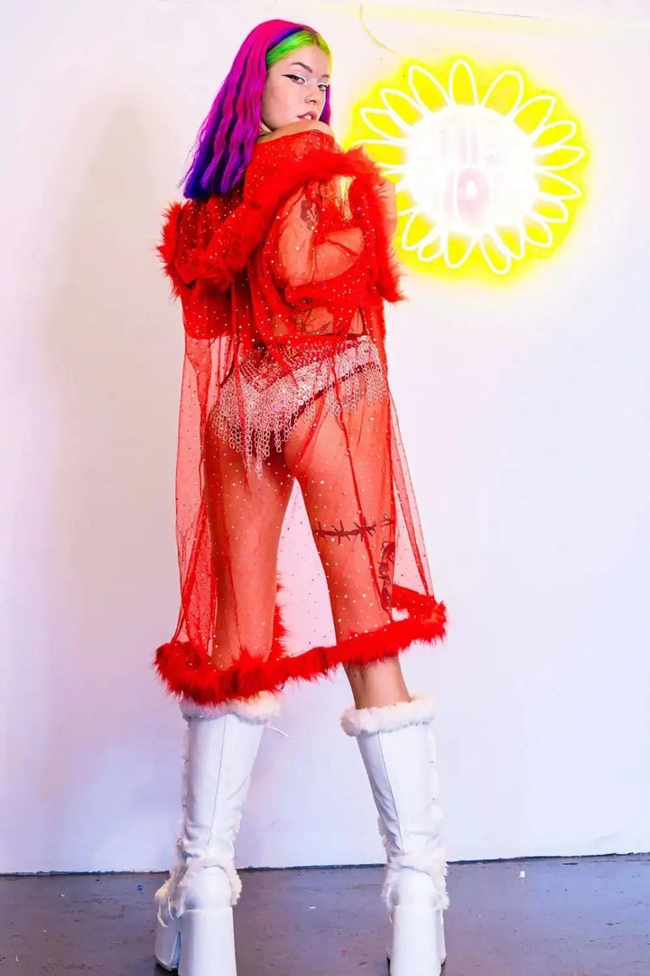 Red faux fur kimono over sequin outfit, side view