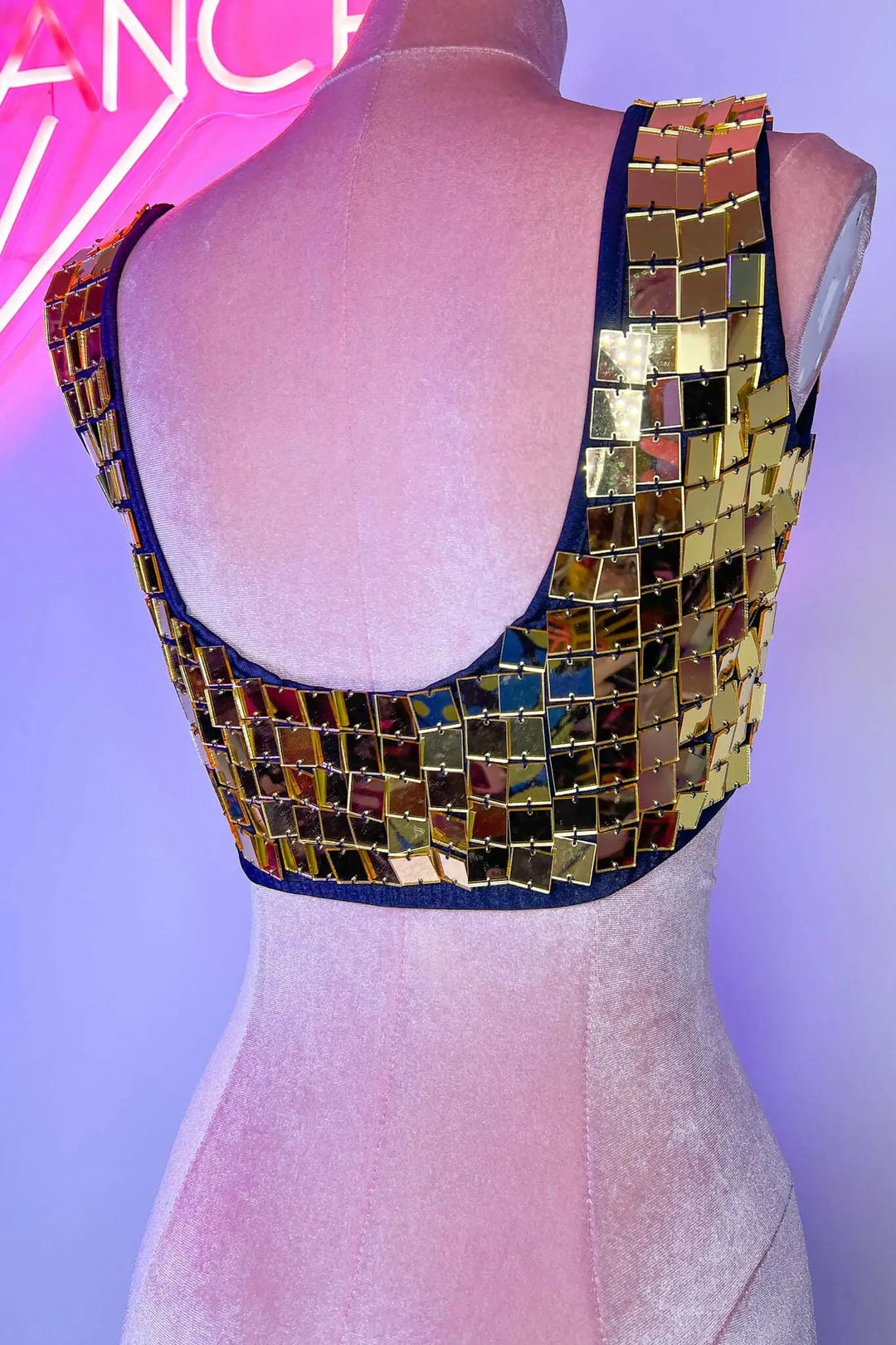 Rear angle of Gold Molly Mirror Crop Top on mannequin