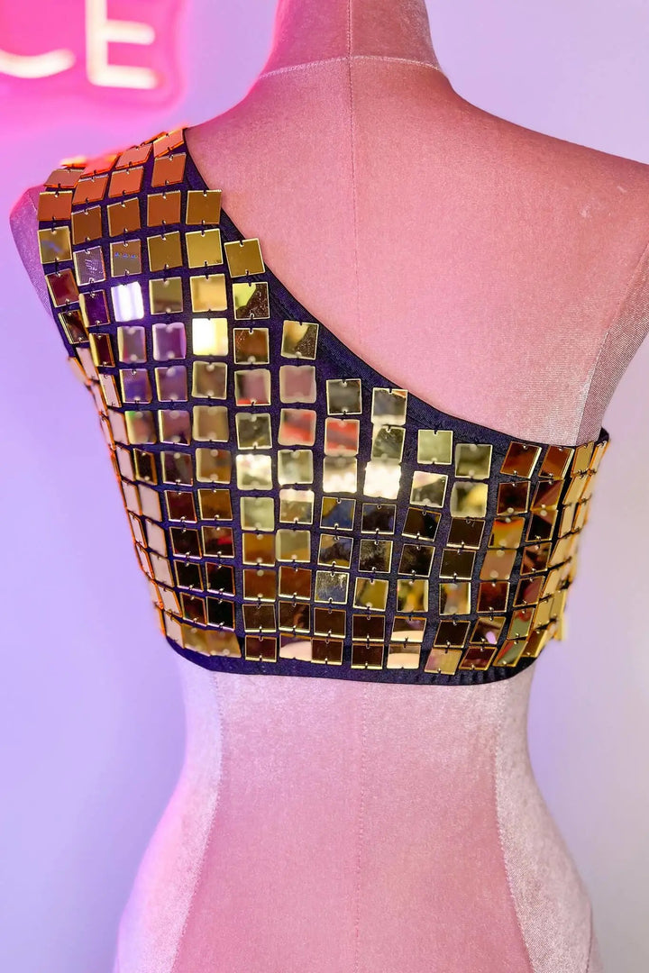 Back of gold mirror crop top on mannequin