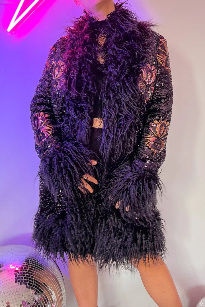 Close-up of Stardust Lux Faux fur Coat with intricate sequins