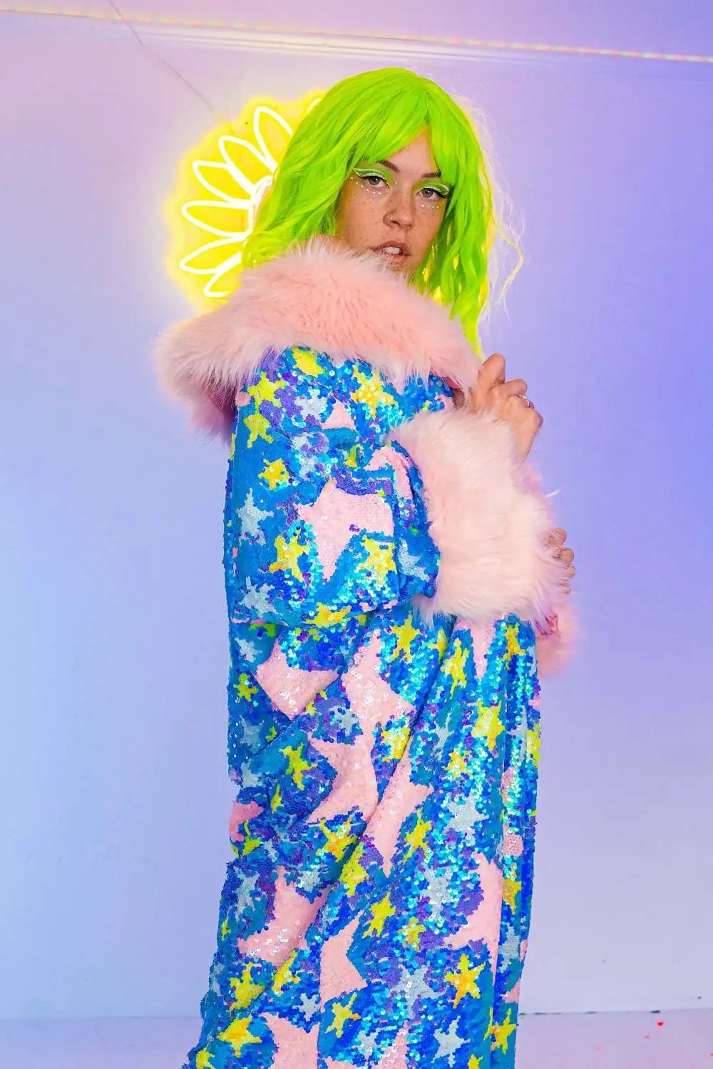 Colorful star jacket with pink fur, ideal for festivals