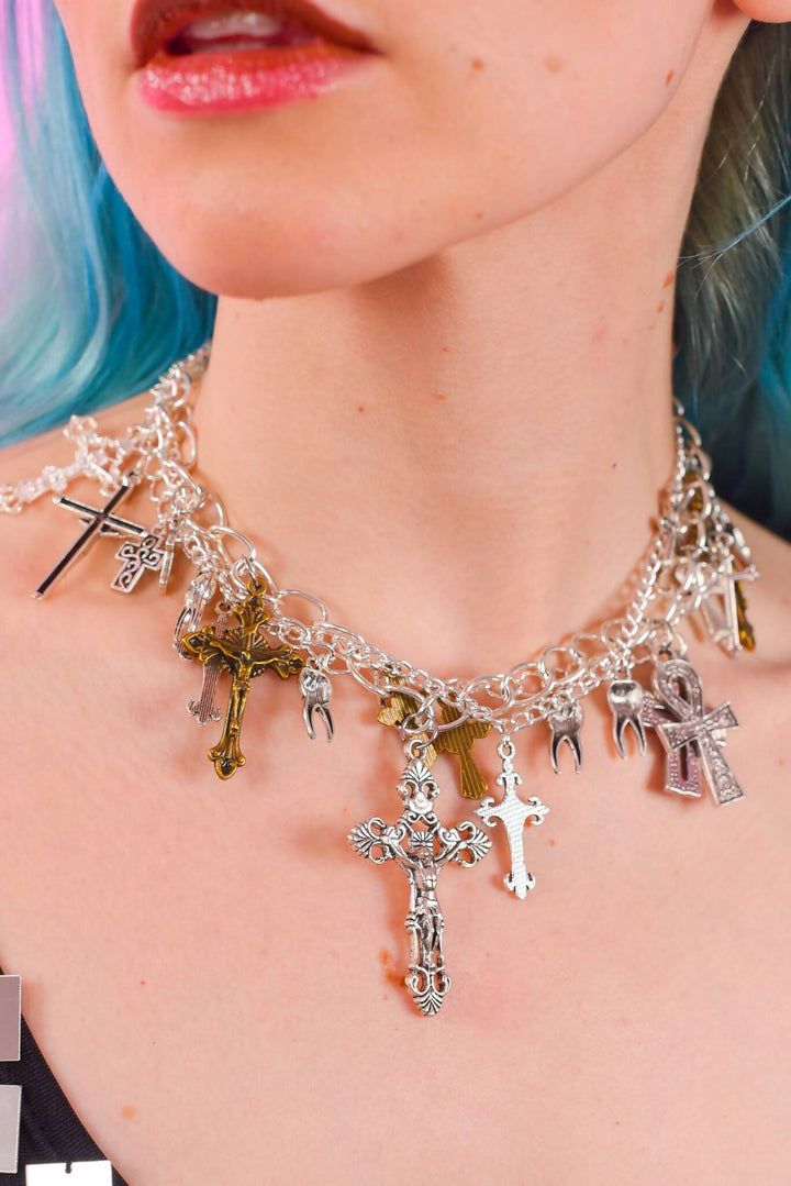 Unholy Chains necklace with cross charms on model.